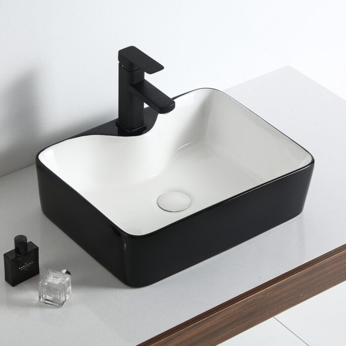Bowl bicolor negro con fondo blanco de loza vitrificada, diseño moderno y fácil de limpiar para baños elegantes.