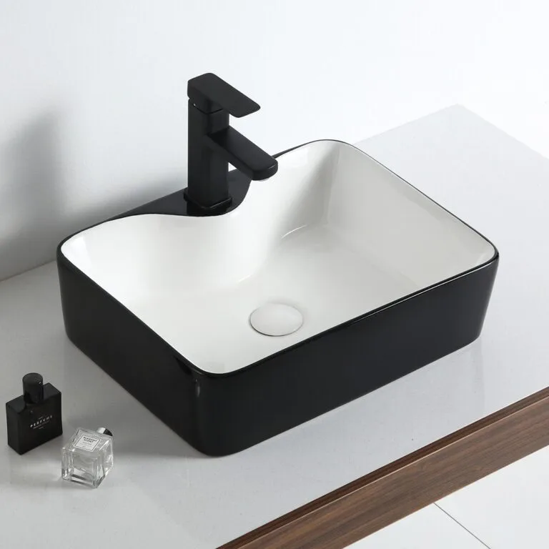 Bowl bicolor negro con fondo blanco de loza vitrificada, diseño moderno y fácil de limpiar para baños elegantes.