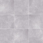 Cerámico Cemento Piso Concreto Gris 45x45 cm mate con puntos pronunciados, resistente y moderno para alto tráfico. Encuentralo en marketcemico.com